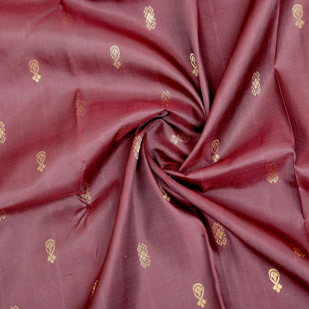 Deep brown with a vibrant coral-pink zari pallu kanjeevaram silk sari
